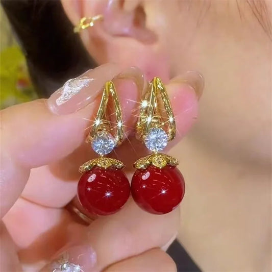 BOUCLES D'OREILLES PERLE ROUGE