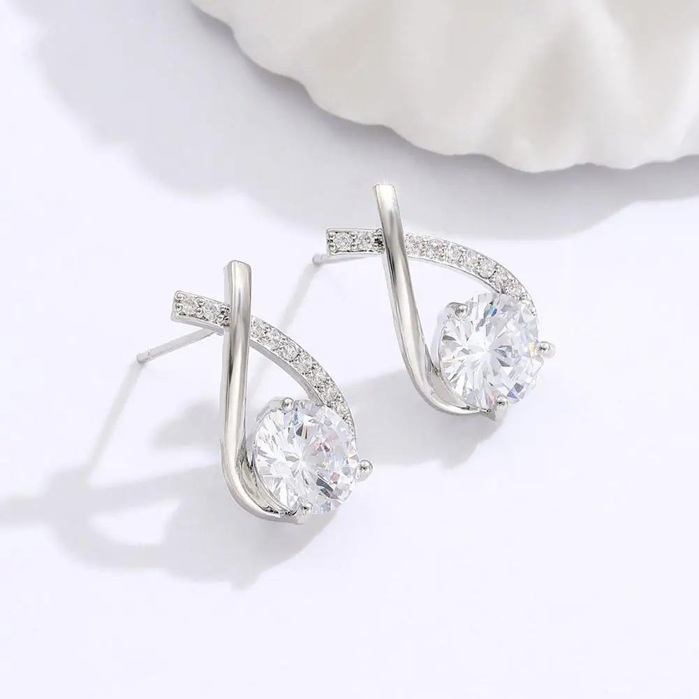 BOUCLES D'OREILLES FORME DE CROIX AVEC CRISTAL