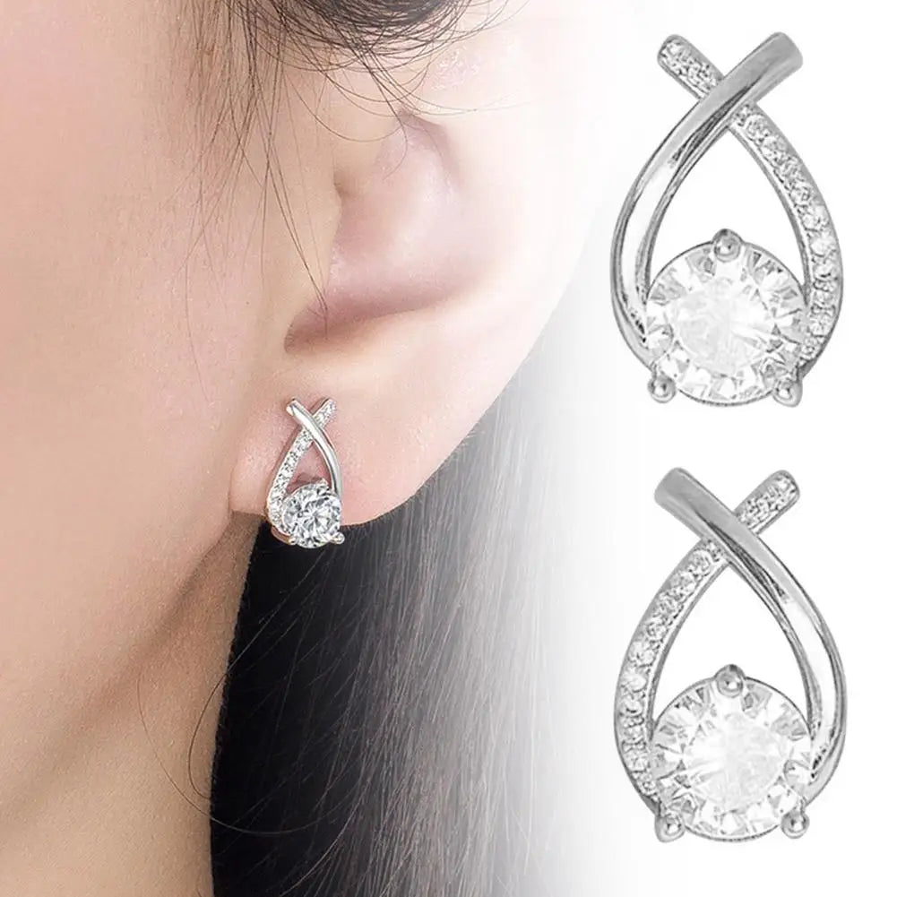 BOUCLES D'OREILLES FORME DE CROIX AVEC CRISTAL