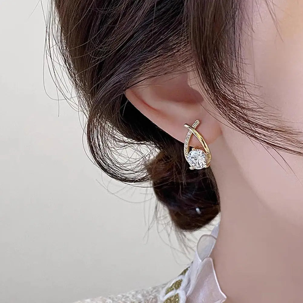 BOUCLES D'OREILLES FORME DE CROIX AVEC CRISTAL