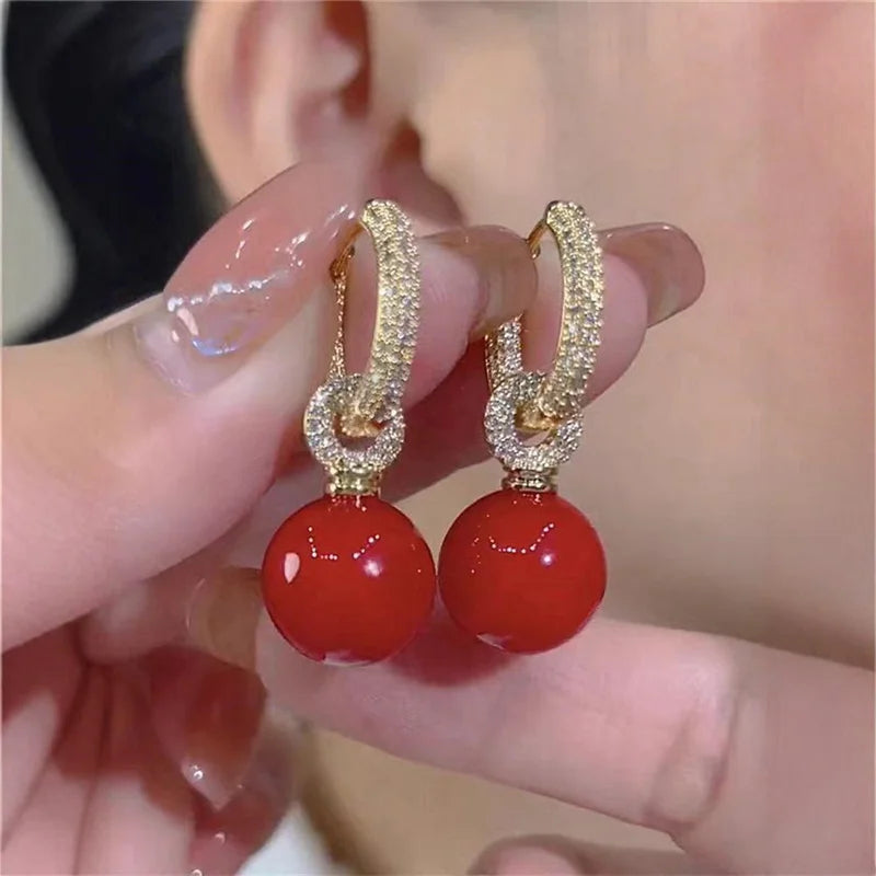 BOUCLES D'OREILLES PERLE ROUGE