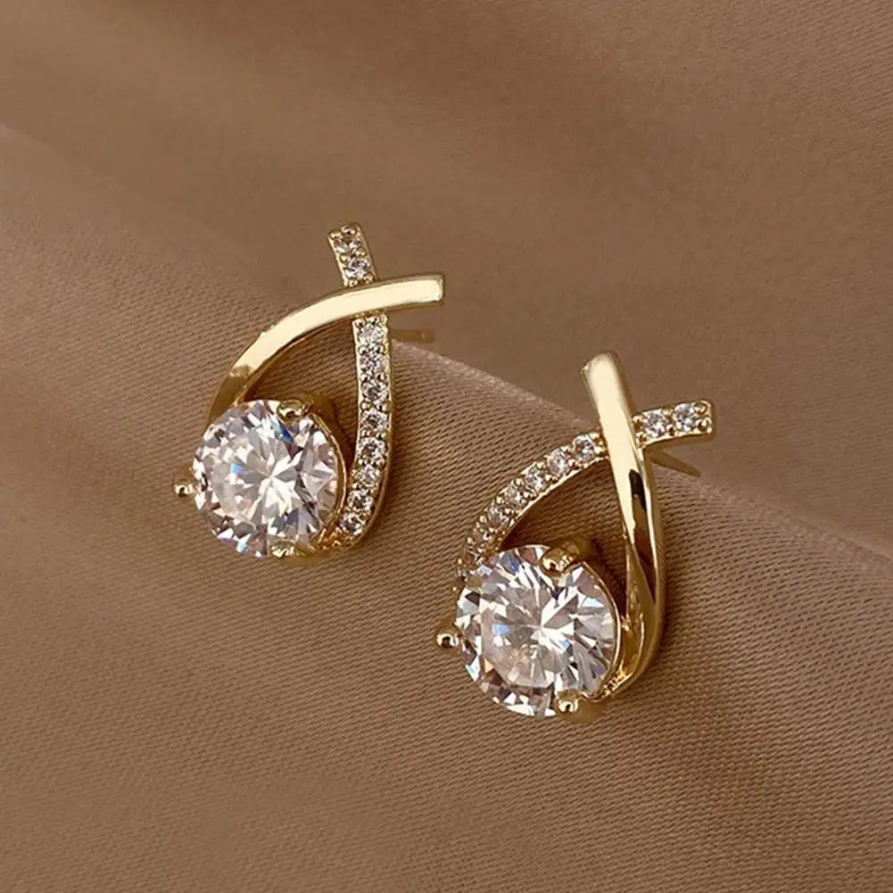 BOUCLES D'OREILLES FORME DE CROIX AVEC CRISTAL